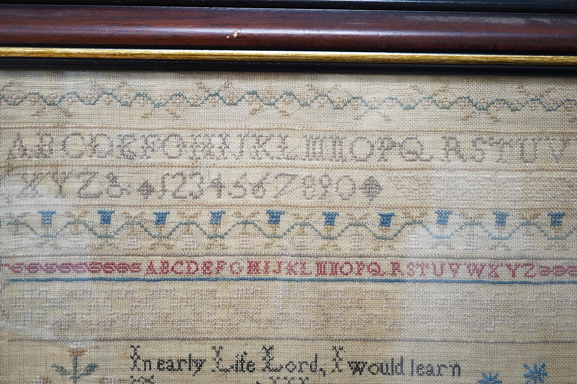 Two mid 19th century samplers worked by Elizabeth White, one dated 1842 aged 8 years, the other 1844 aged 11 years, both worked with a country scene of a house, birds, dogs and trees, the earlier sampler with a top panel